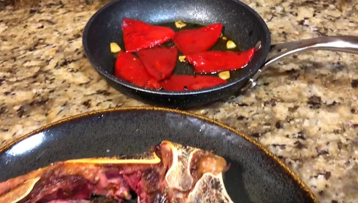 Servir junto con pimientos del piquillo (opcional). [212.76]