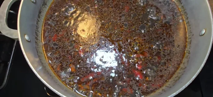 Cocina a fuego medio-alto, tapado, hasta que el agua se reduzca.