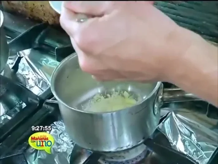 Agregar el cuscús hidratado y el puré de auyama a la sartén.