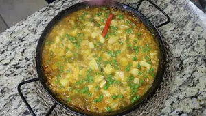 Arroz Meloso con Bacalao: Receta fácil y deliciosa de Barcelona