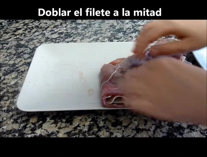 Tapar con la otra mitad del filete, procurando que quede bien sellado (112.21).